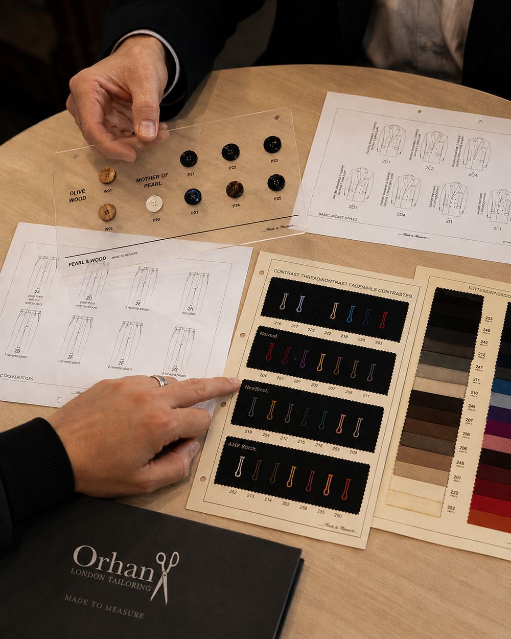 Choosing buttons and jacket styles at a consultation