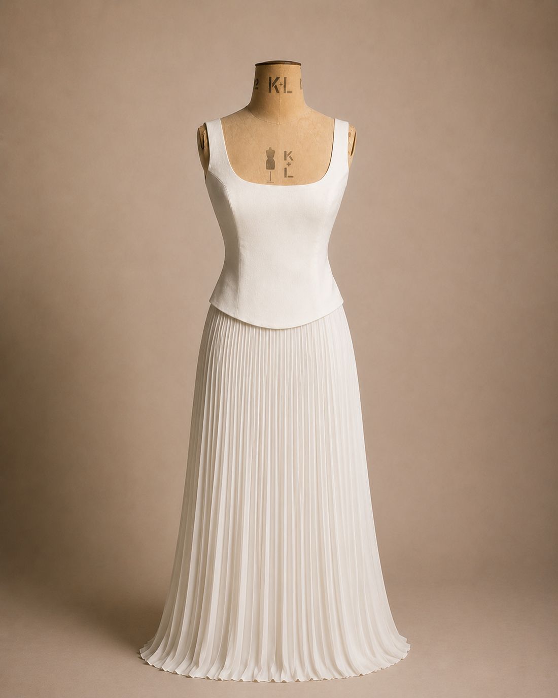 White corset bodice and pleated bridal skirt