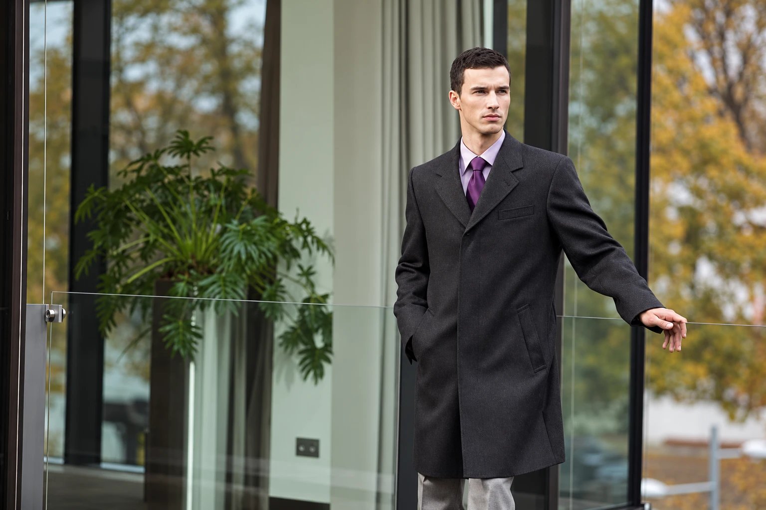 A grey coat and waistcoat in a Westminster colonnade