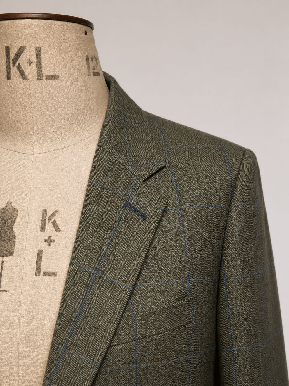 Checked tweed detail at the shoulder and lapel